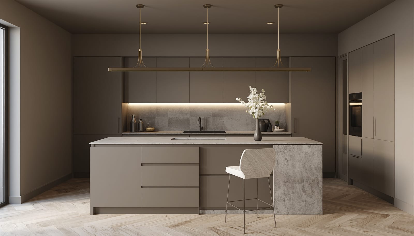 Handleless matte grey modern kitchen with an island and quartz worktop